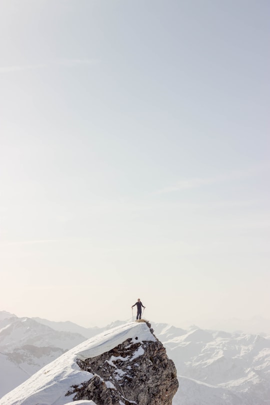 person standing on top of mountain during daytime in Chamonix France