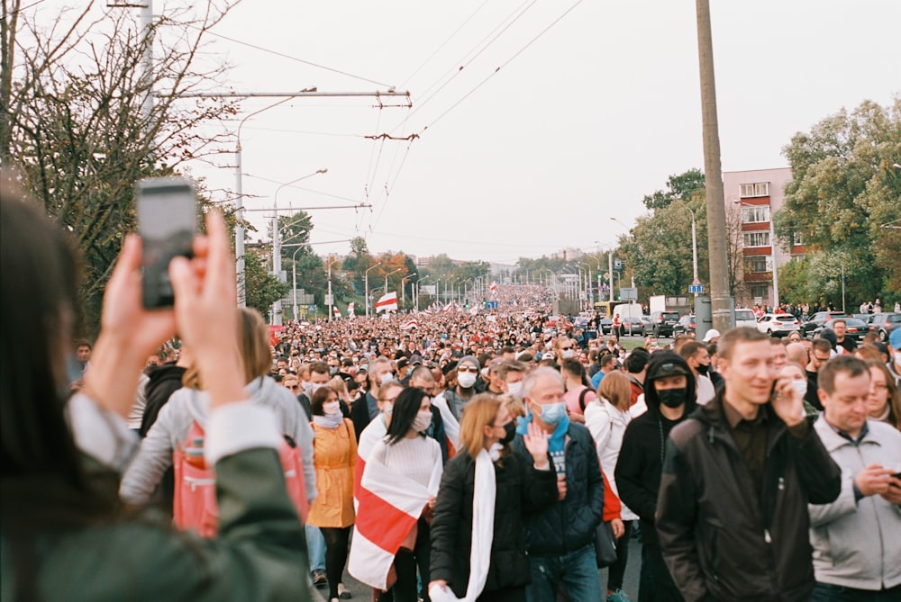 people gathering on street during daytime