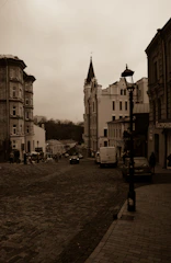 A sepia-toned historic photo of Enon Valley's main street bustling with early 20th-century life.
