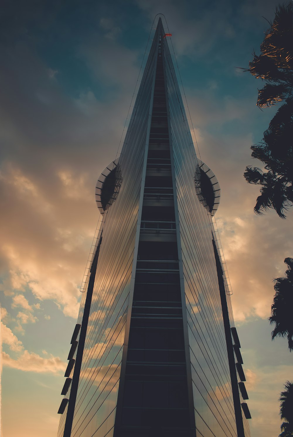 low angle photography of gray high rise building