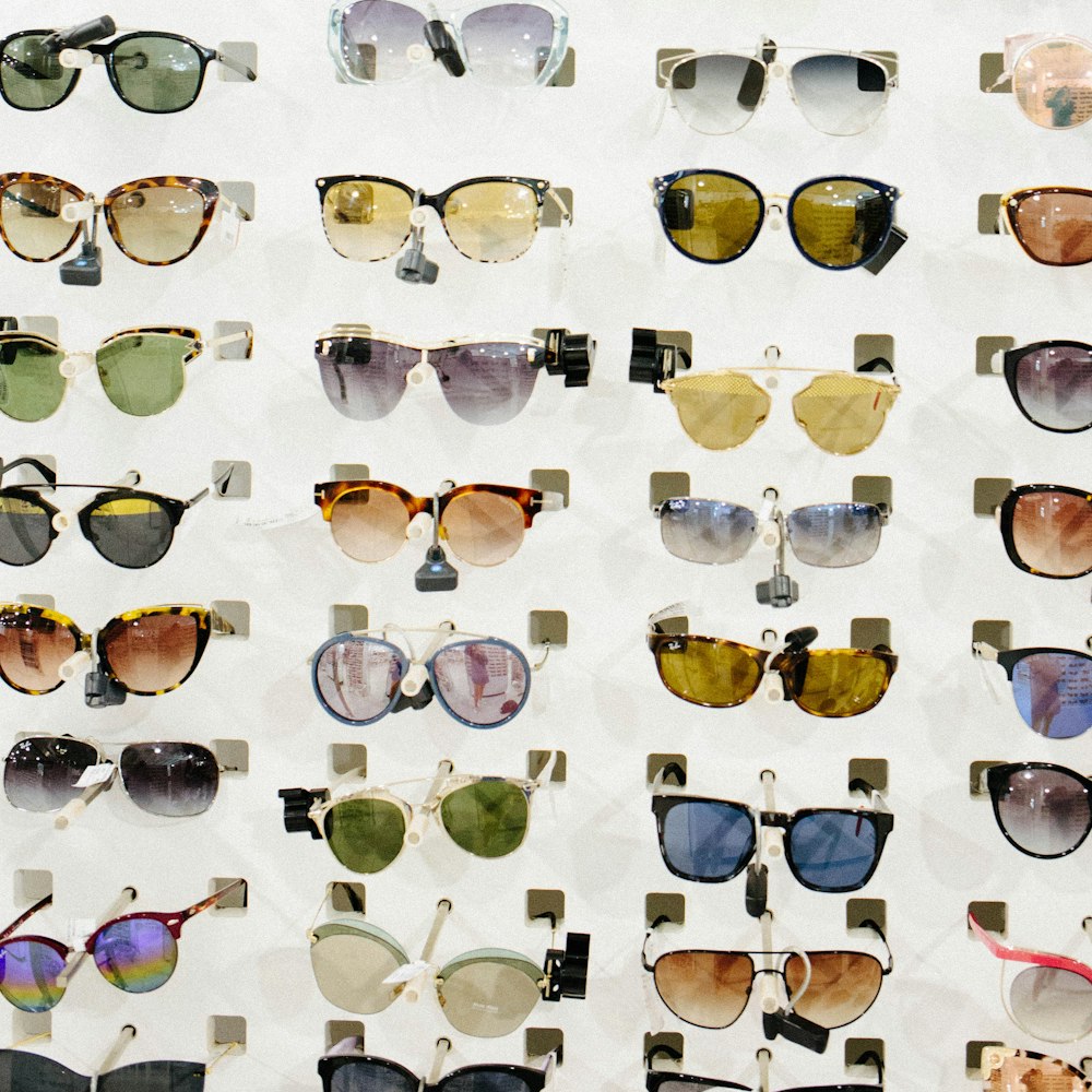 a display of many different types of sunglasses