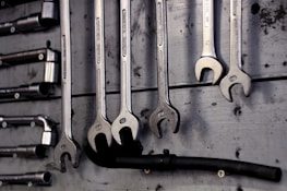 Various plumbing equipment and tools arranged neatly.