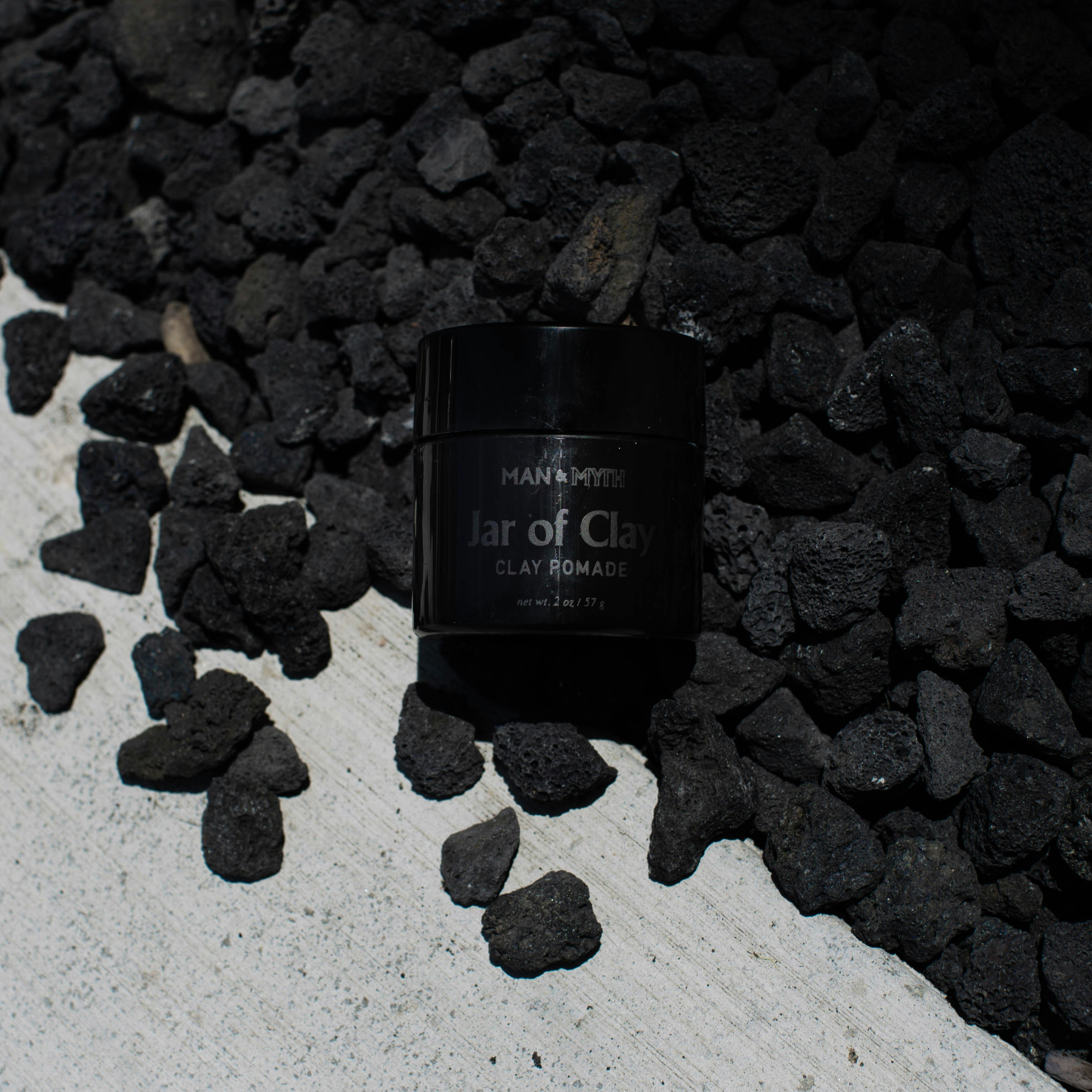 Conteneur rond noir et argent