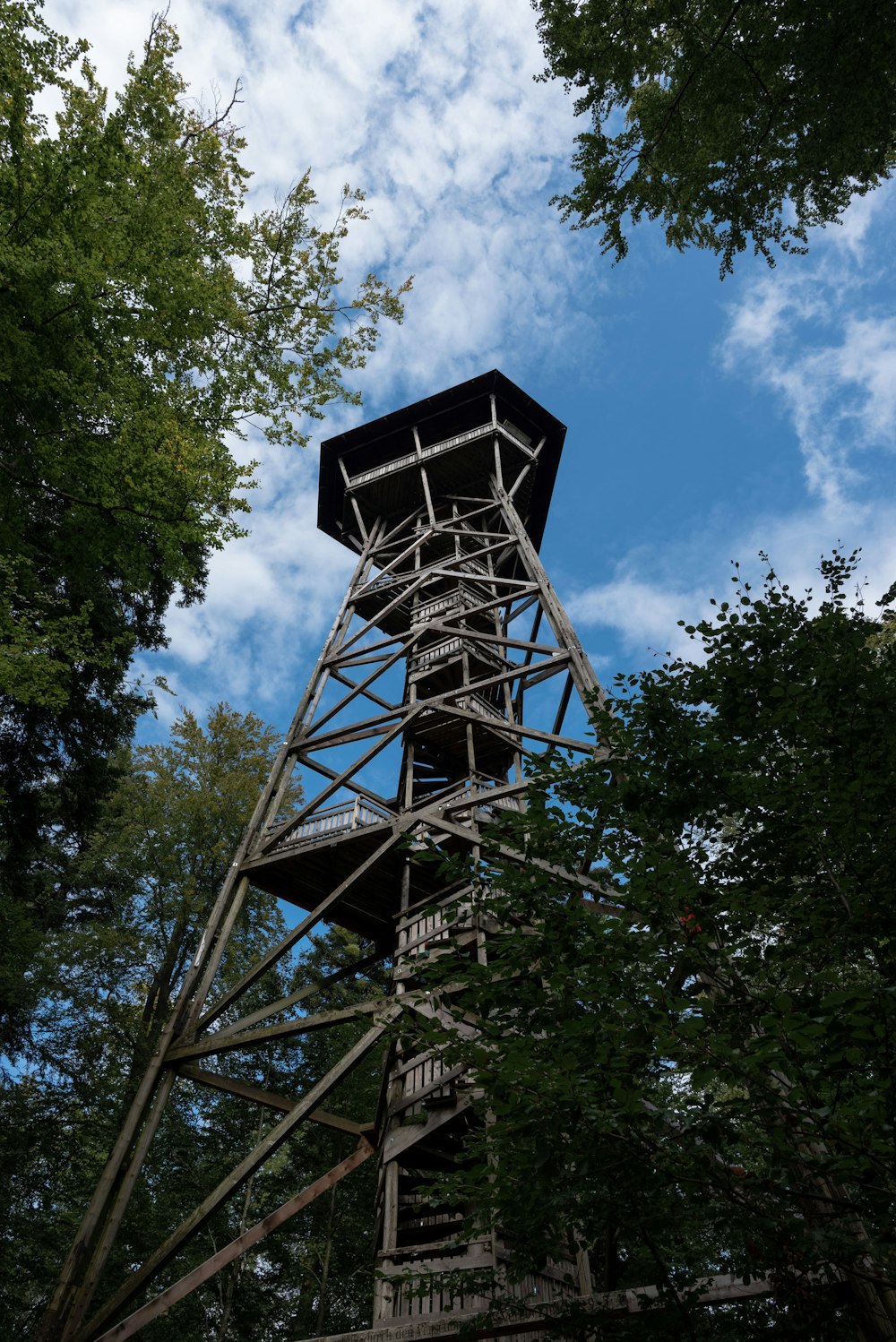 black metal tower under blue sky