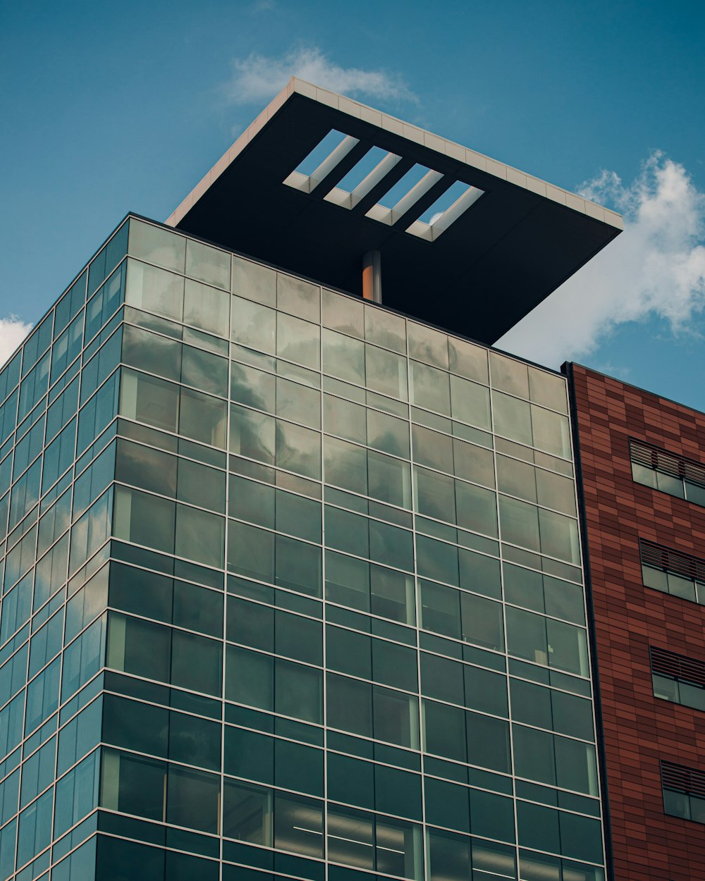 brown and white concrete building under blue sky during daytime