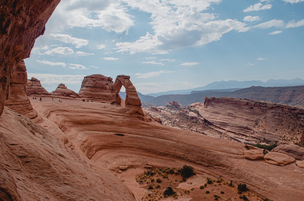 brown rock formation under blue sky during daytime