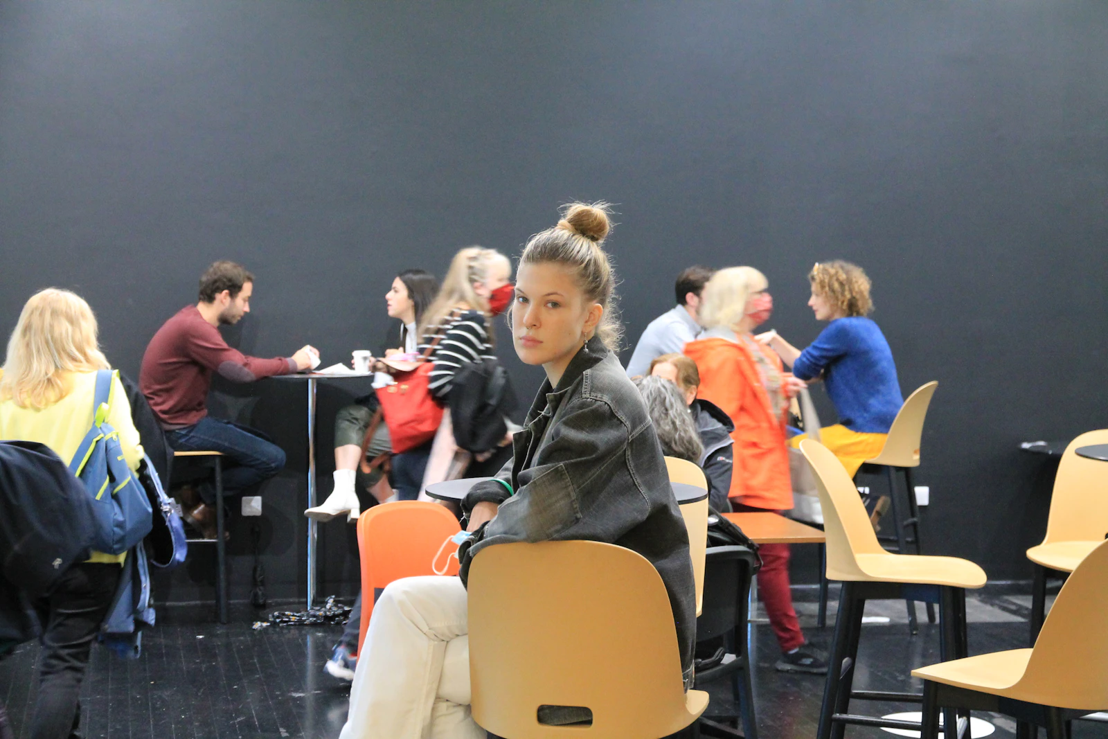 People sitting together in a room for discussion