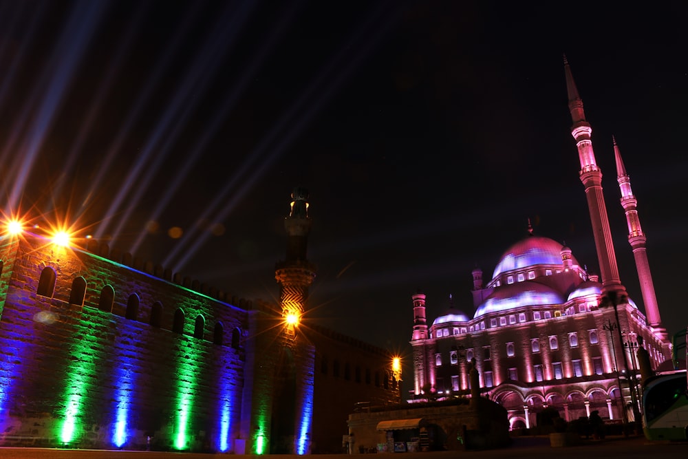 green and blue lighted building during nighttime