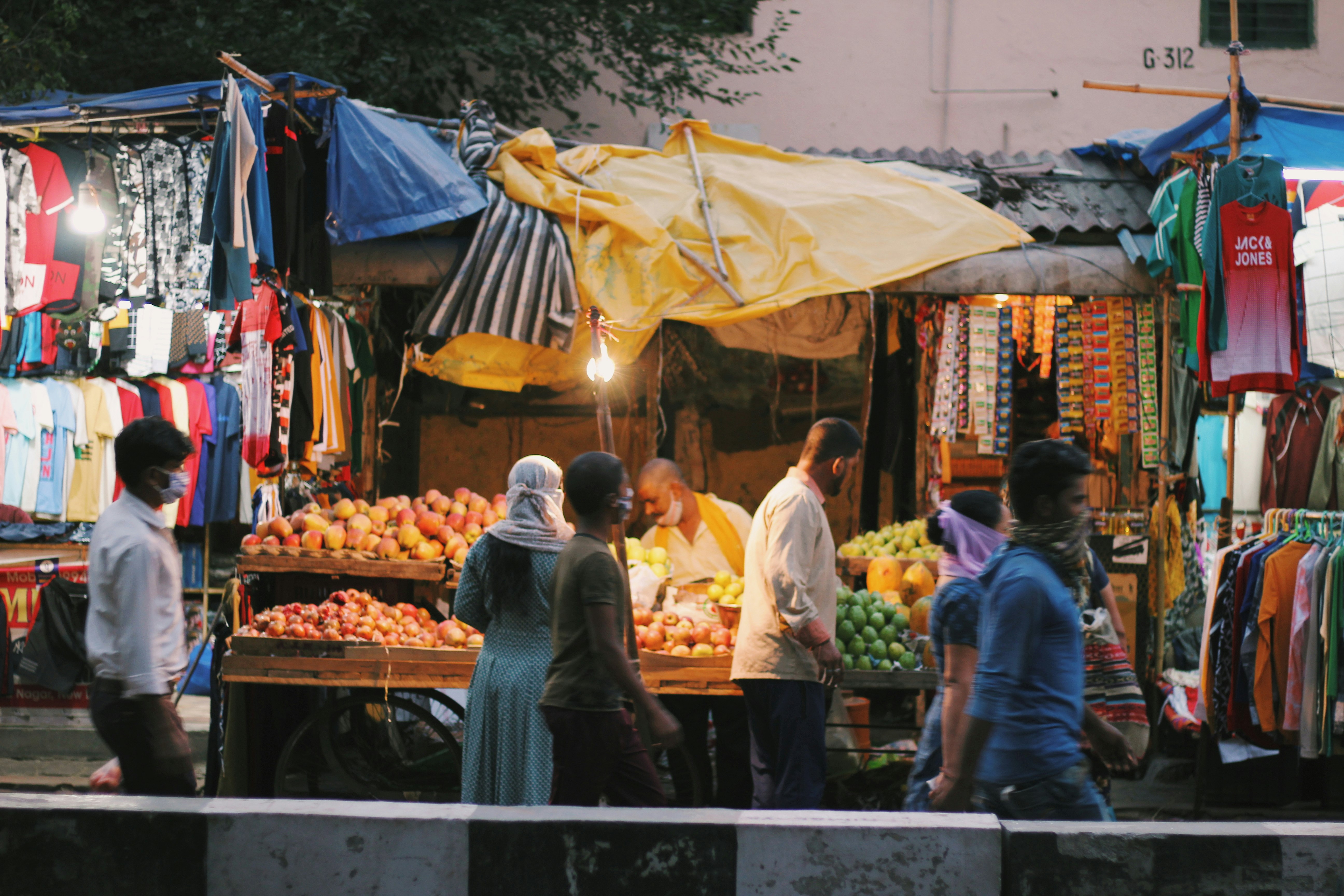 people in market during daytime