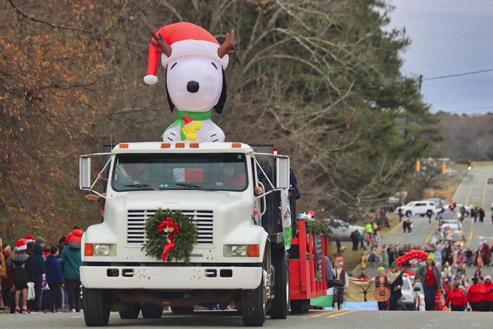 santa claus figurine on white truck