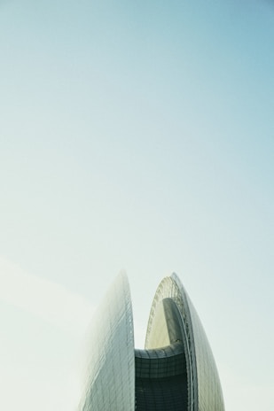The exterior of the myzh technology office building under a clear sky, showcasing its modern architecture.