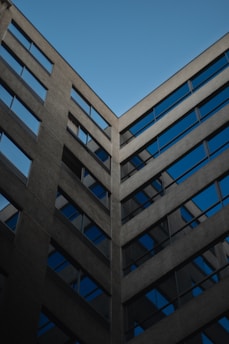 white concrete building under blue sky during daytime