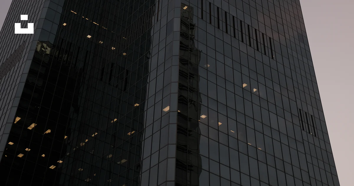 High Rise Balck Gold Building Black high rise building during daytime photo – Free Building Image on ...