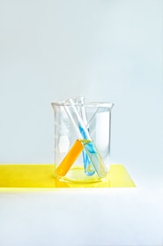 clear glass pitcher on blue square table