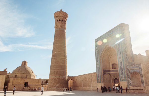 Brown concrete building under blue sky during daytime — Bukhara, Uzbekistan