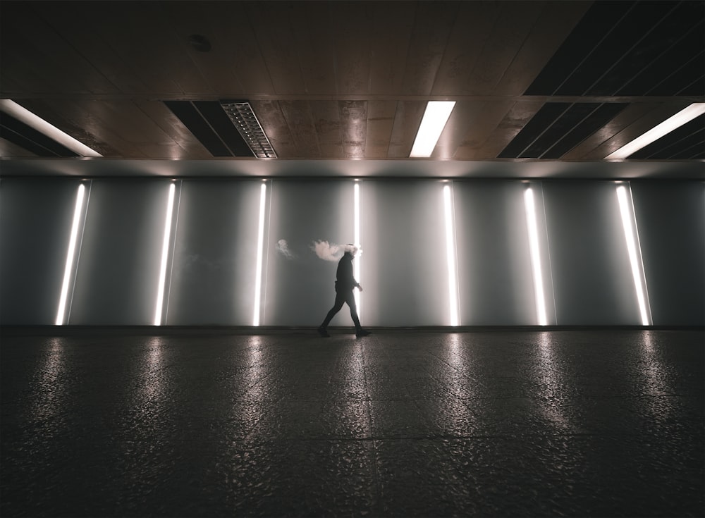 person walking in a hallway
