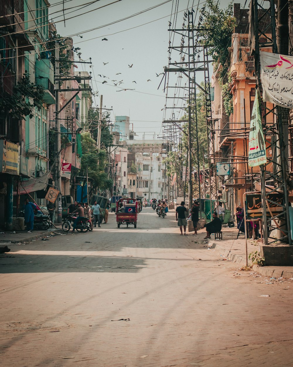 cars parked on street near buildings during daytime