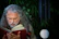 A caring middle-aged man reading a book about Alzheimer's, showing dedication.
