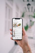 person holding white samsung galaxy smartphone