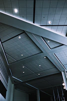 Modern ceiling with recessed LED lighting showcasing clean drywall craftsmanship in a residential project.