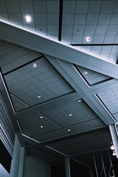 Wide view of a modern suspended ceiling design in a residential living room