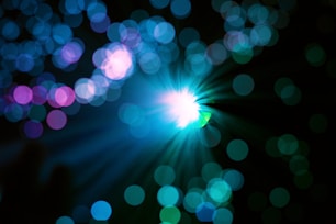 green and blue light showing photon superposition