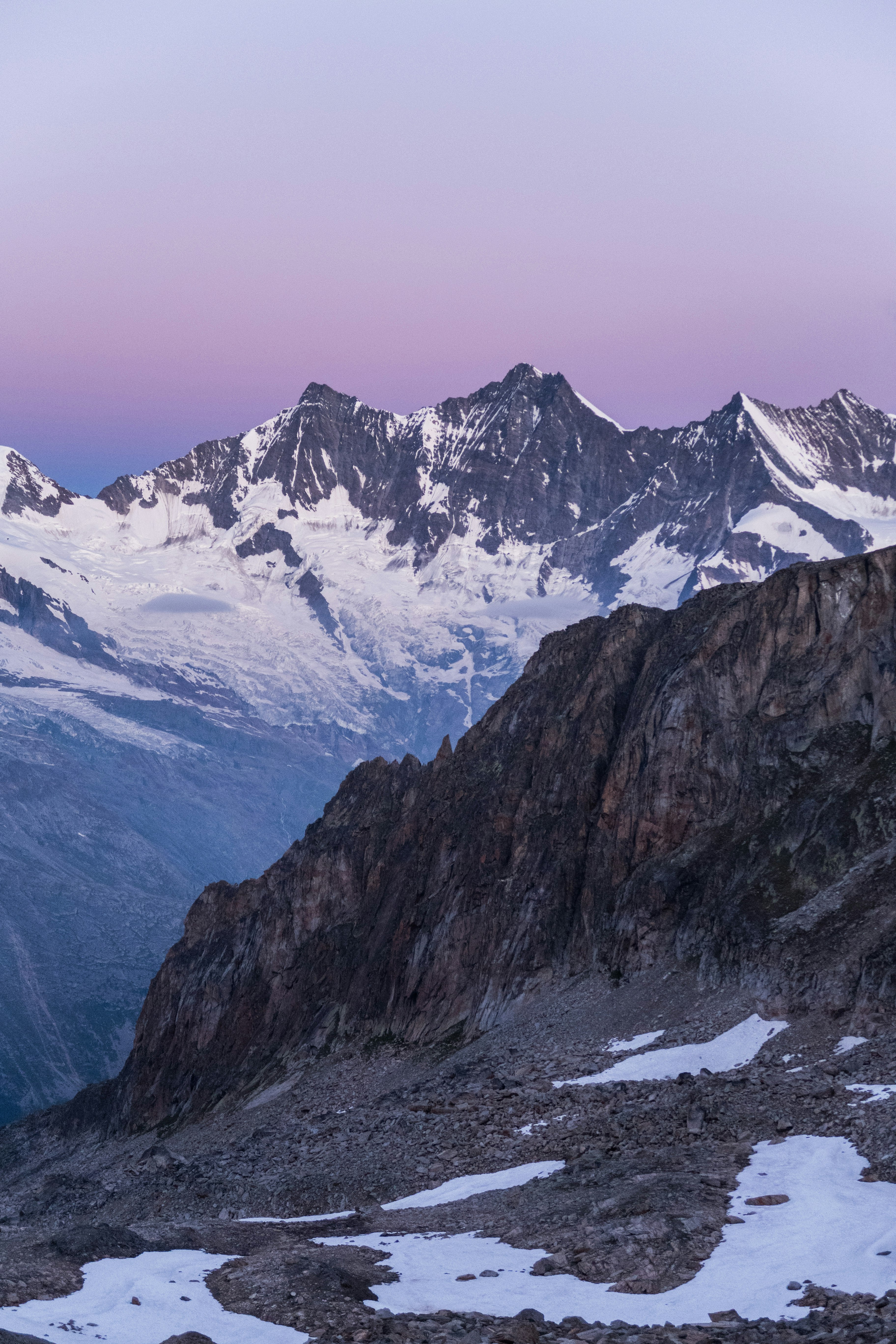 snow covered mountain during daytime