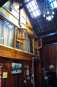 Interior shot showing bohemian chic decor with terracotta accents and airy spaces.