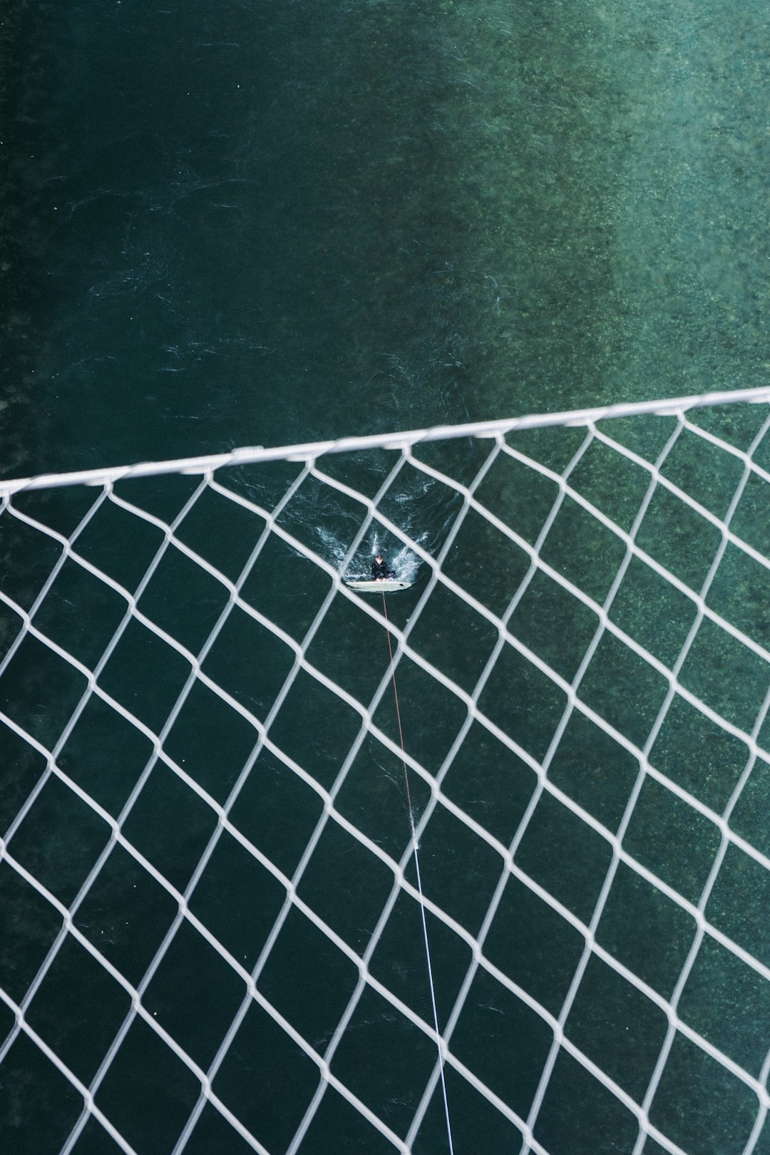 white net on black concrete floor