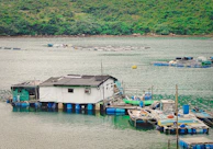Close-up of eco-friendly materials used in the construction of a floating home.