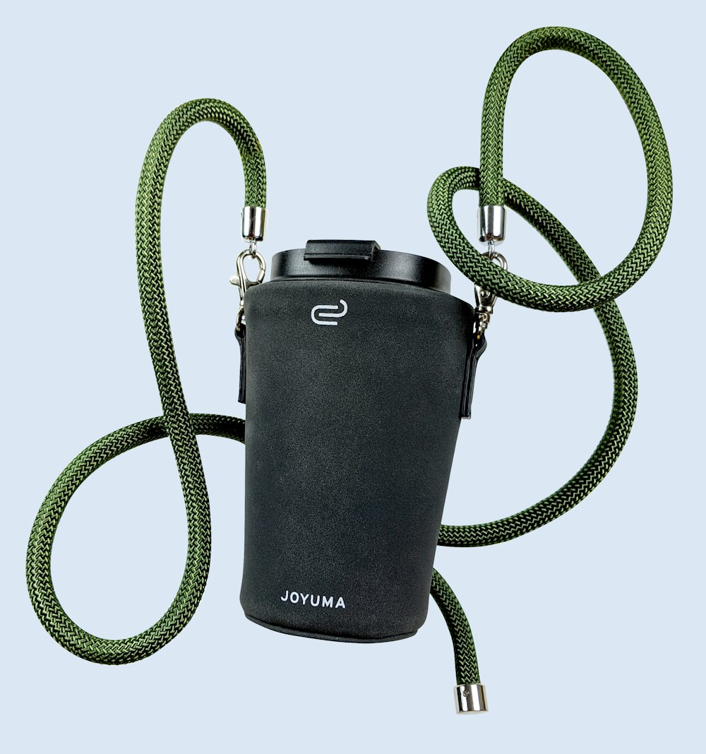 black and green nikon dslr camera bag