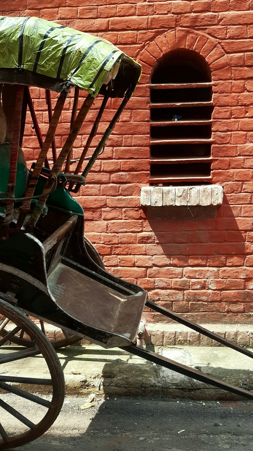 black and green wooden carriage