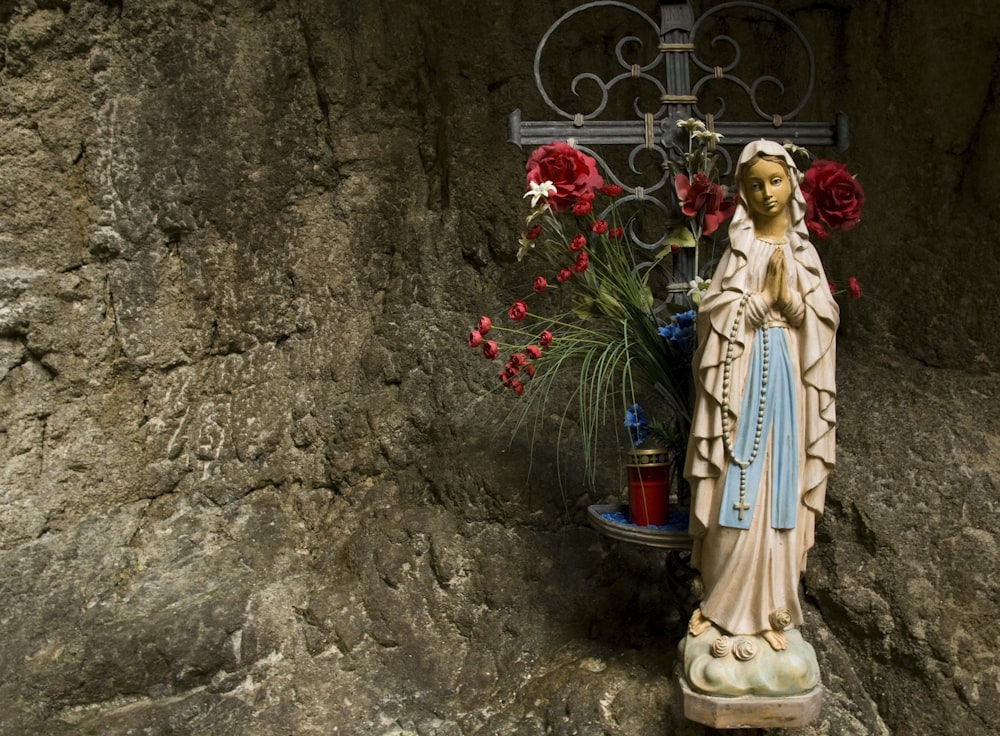 woman in white and blue dress figurine