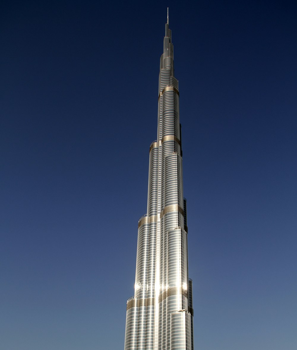 white and black tower under blue sky during daytime