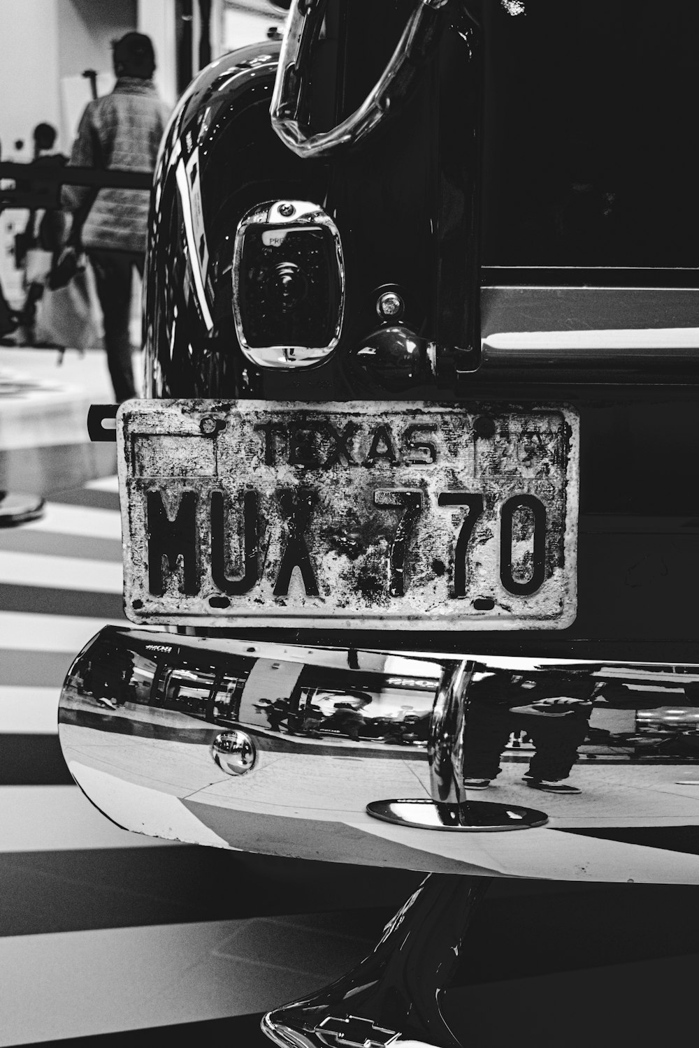 grayscale photo of car with open door