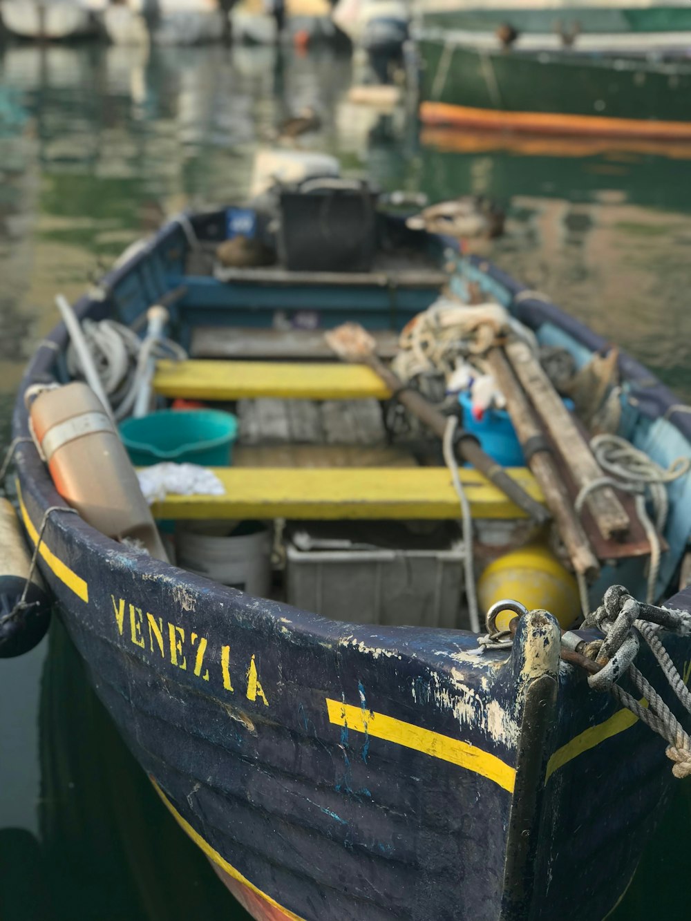 black and yellow boat on water