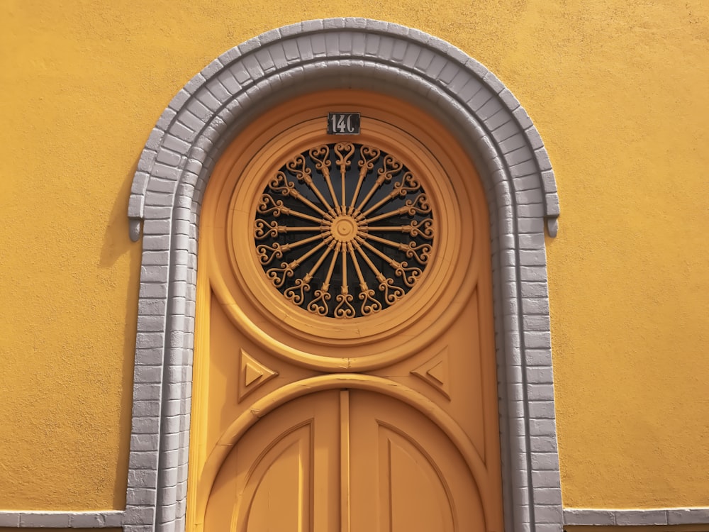 brown wooden door with black metal door