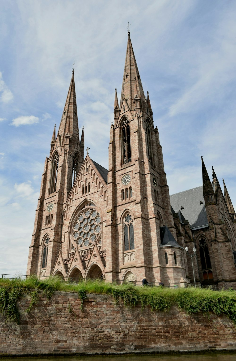 brown concrete church under blue sky during daytime