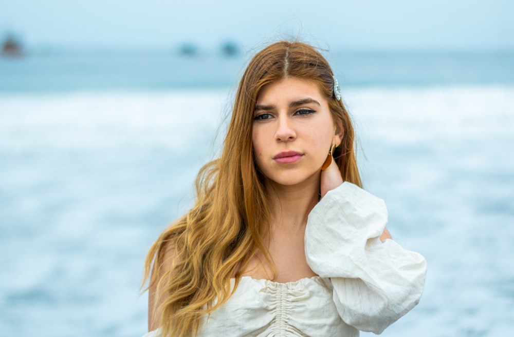 woman in white long sleeve shirt