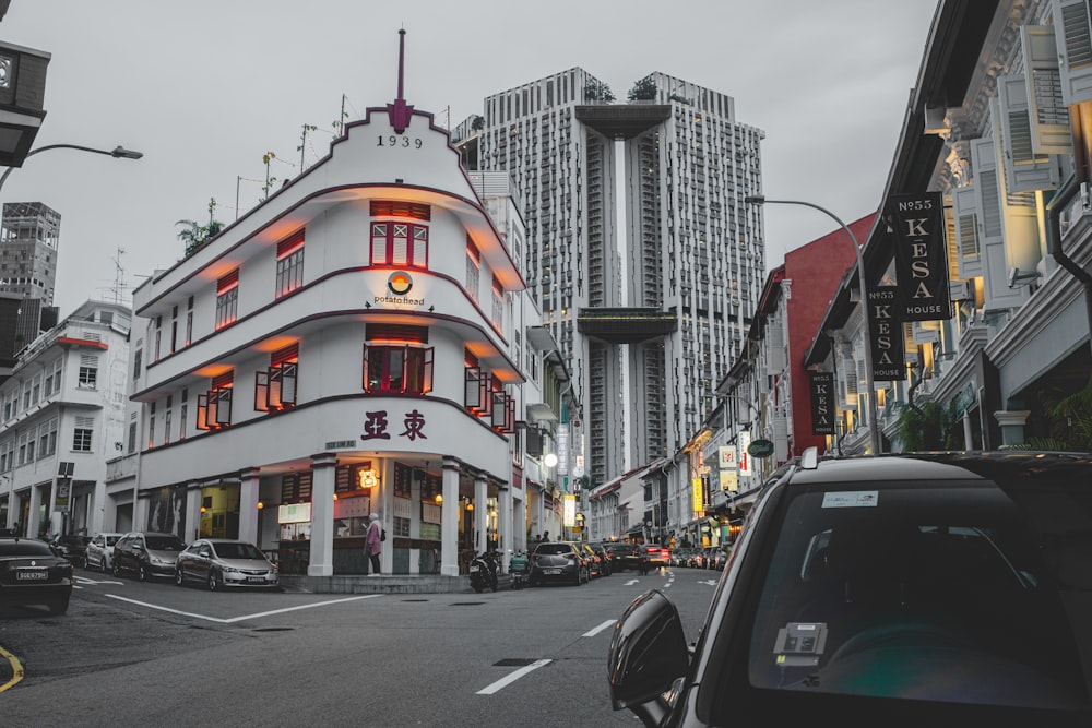 cars parked on street near building during daytime