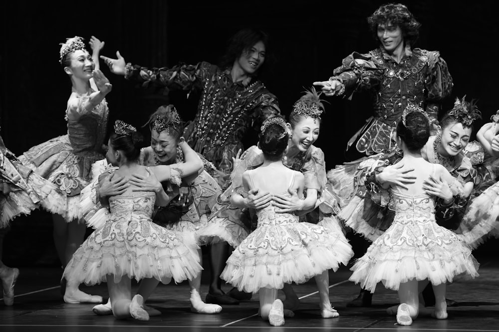 grayscale photo of children in dress