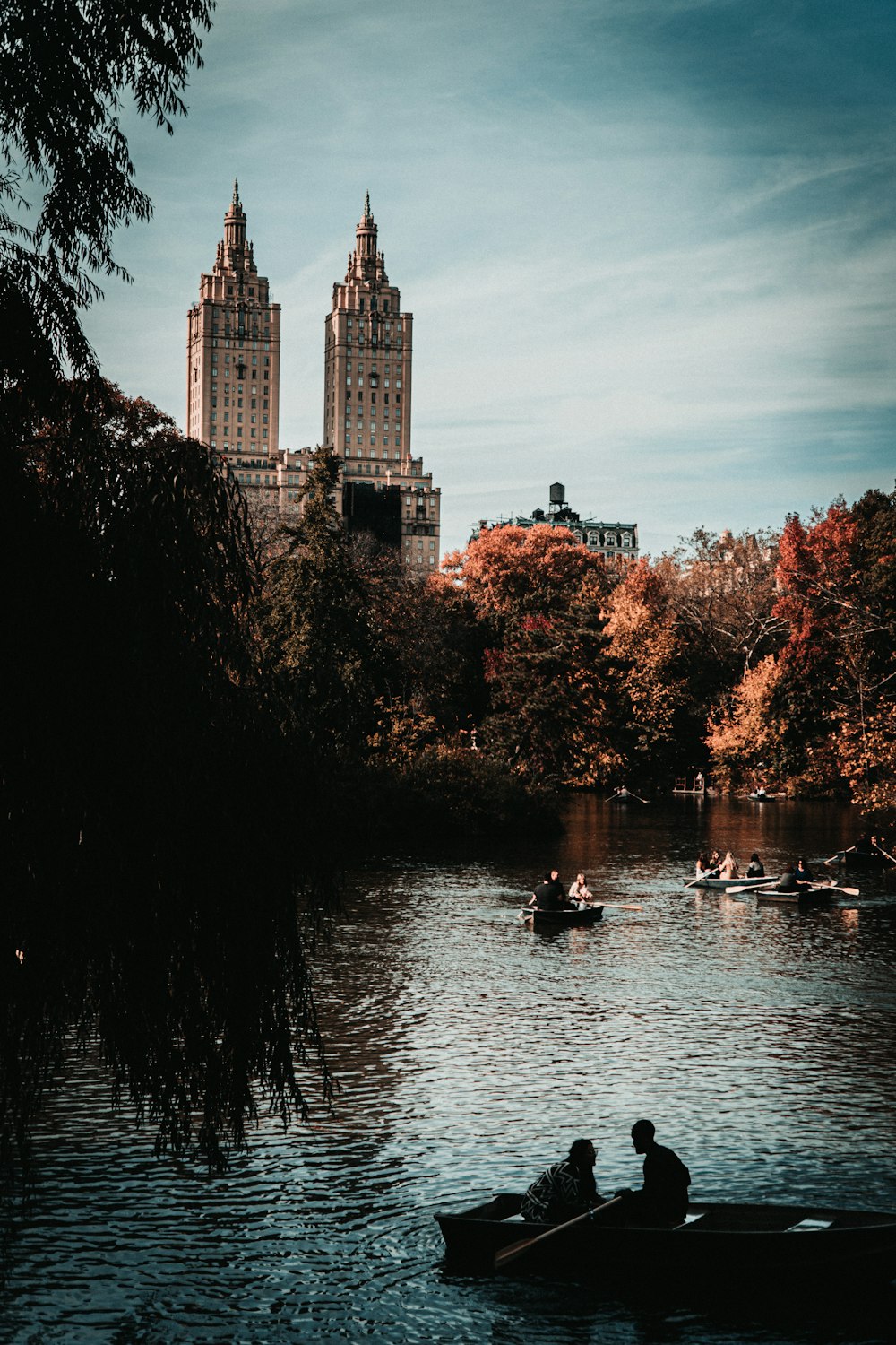 brown concrete building near body of water during daytime