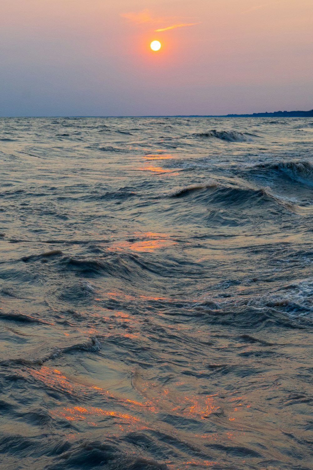 昼間の青空の下で青い海の水の写真 Unsplashで見つけるポートブルースの無料写真