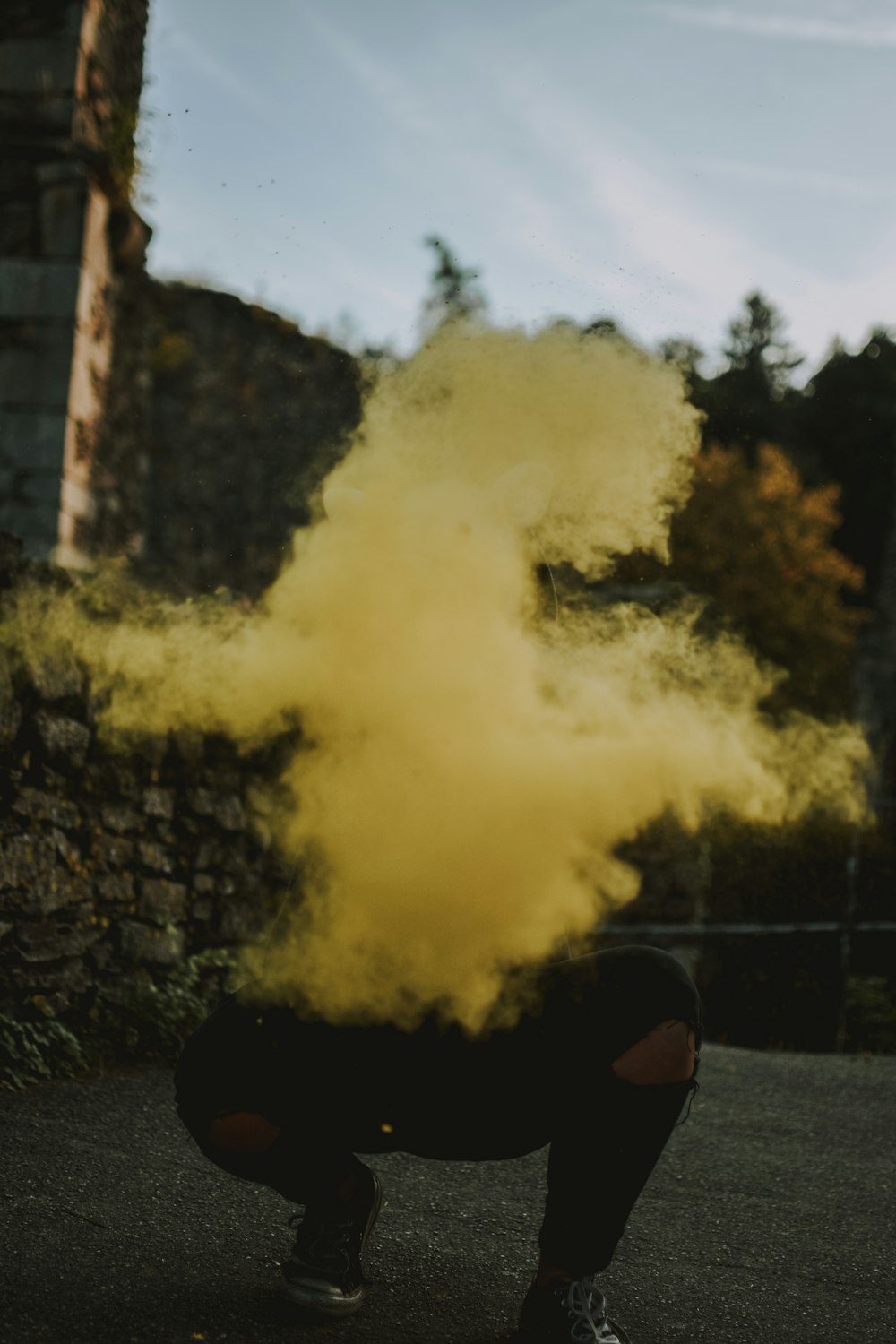 man in black sunglasses smoking