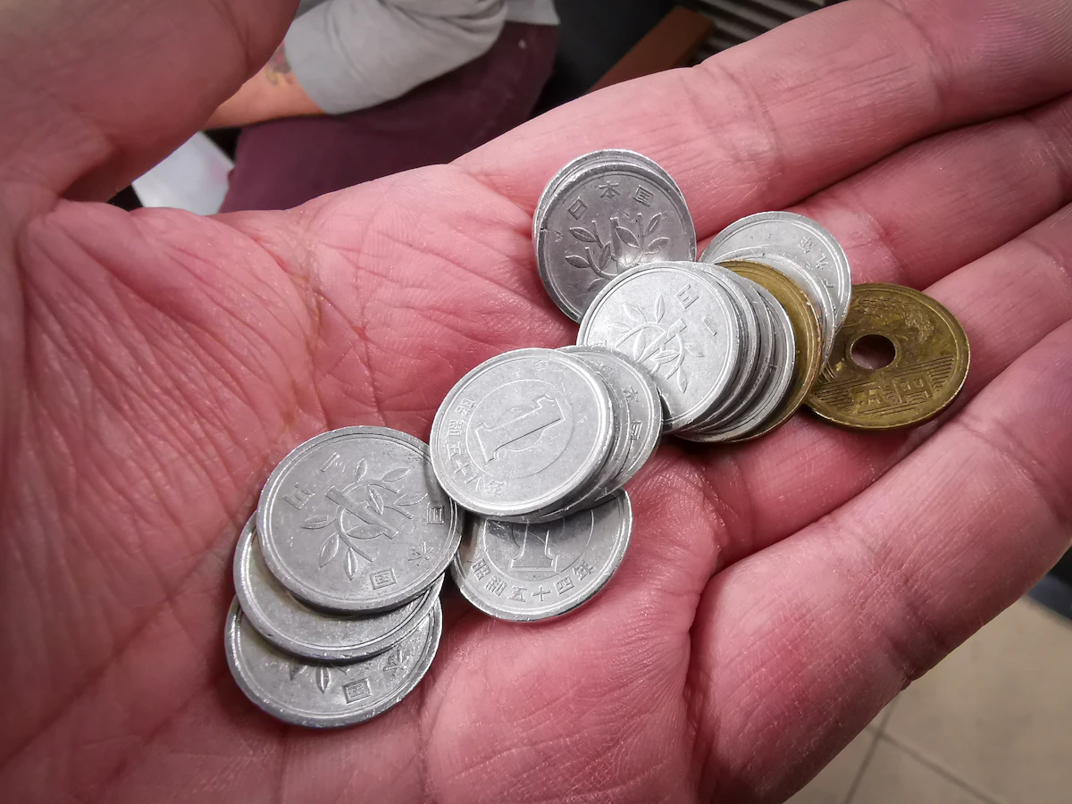 A close-up of various Japanese yen coins