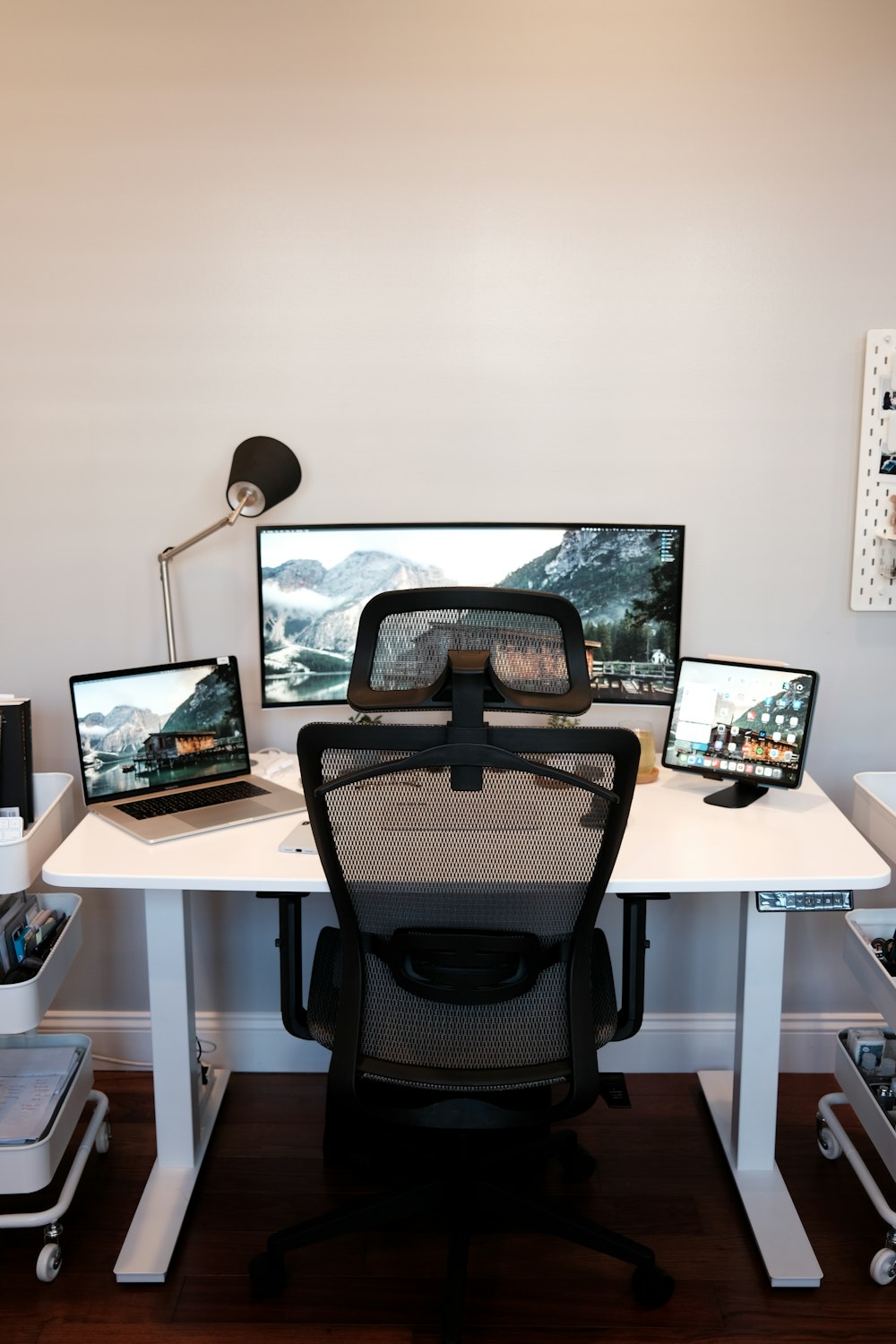 black flat screen computer monitor on white table