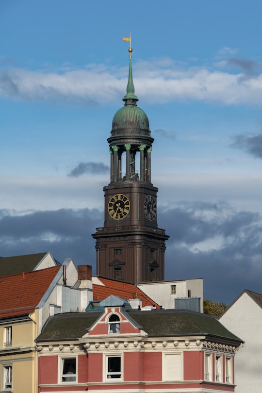 black and brown tower clock in St. Michaelis Church Germany