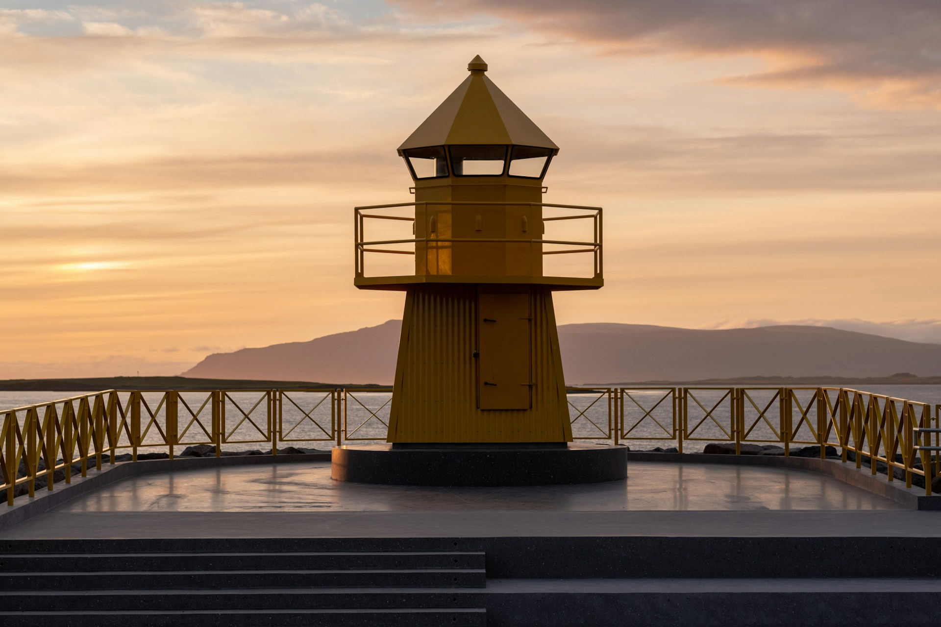 silhouette of lighthouse during sunset