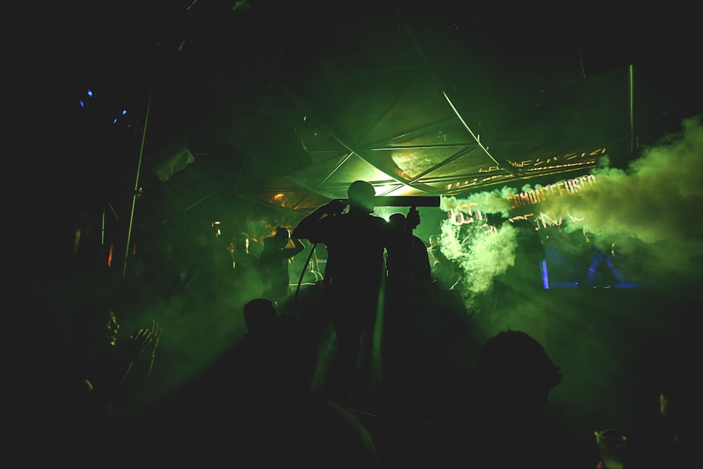 silhouette of people watching concert