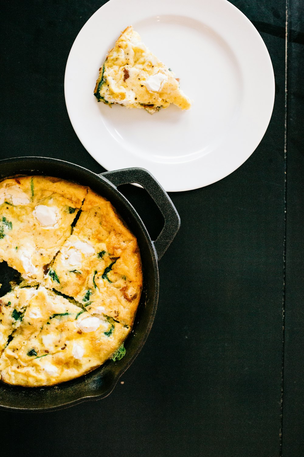 black frying pan with food